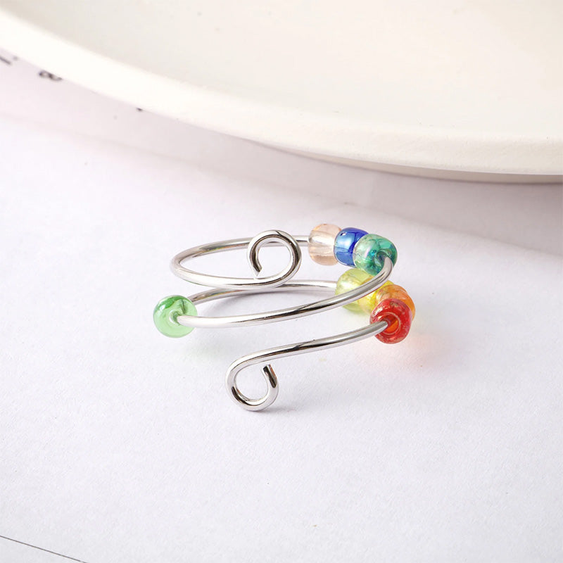Aenya – Bague Fidget avec perles arc-en-ciel