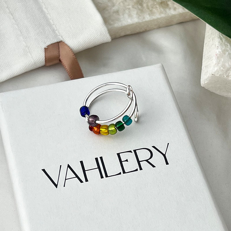 Aenya – Bague Fidget avec perles arc-en-ciel